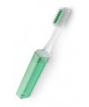 Toothbrush in transparent plastic holder